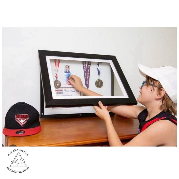 A3 Brilliant Frame in oak, white, or black – magnetic front-opening frame for artwork, medals, and certificates.