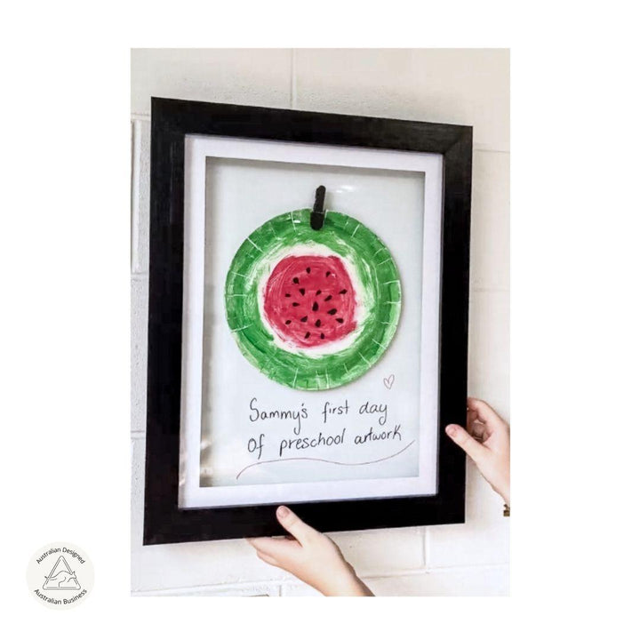 A3 Brilliant Frame in oak, white, or black – magnetic front-opening frame for artwork, medals, and certificates.