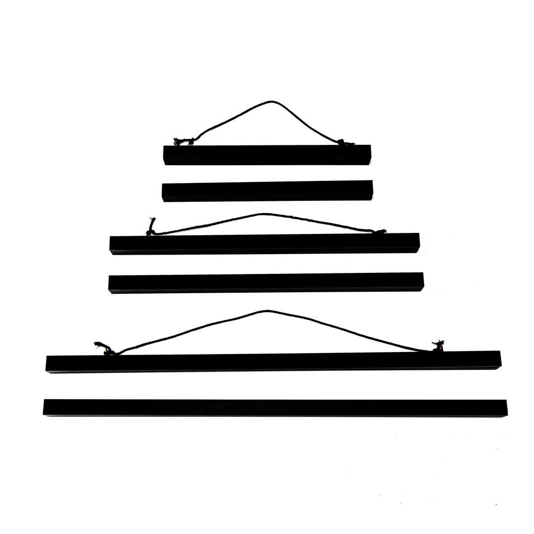 Magnetic black artwork display hanger – modern frame alternative for posters and certificates.