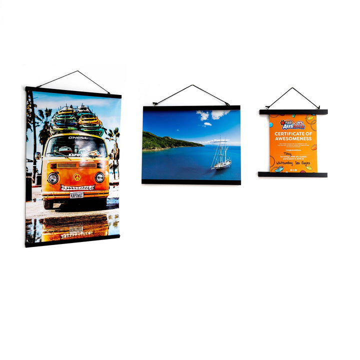 Magnetic black artwork display hanger – modern frame alternative for posters and certificates.
