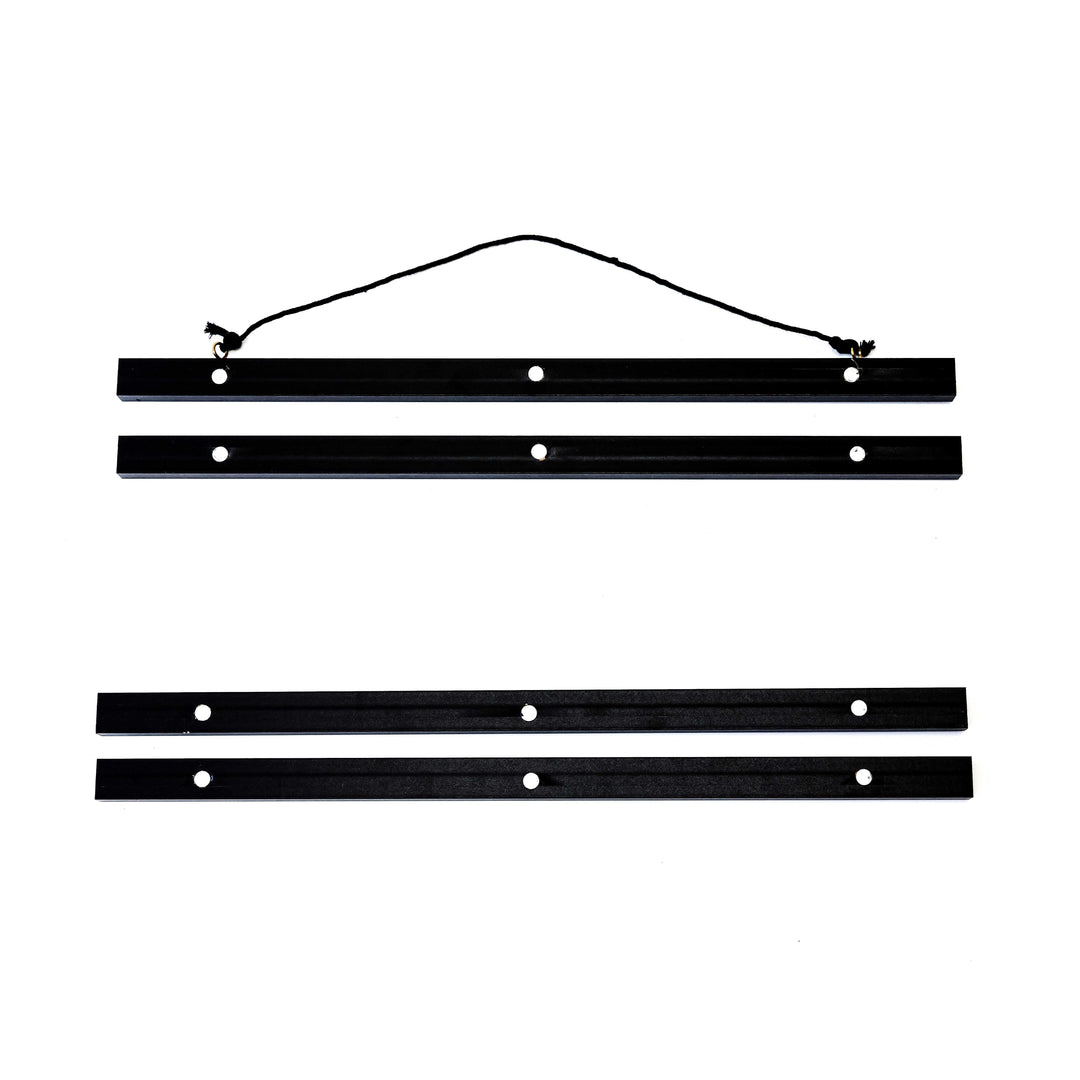 Magnetic black artwork display hanger – modern frame alternative for posters and certificates.