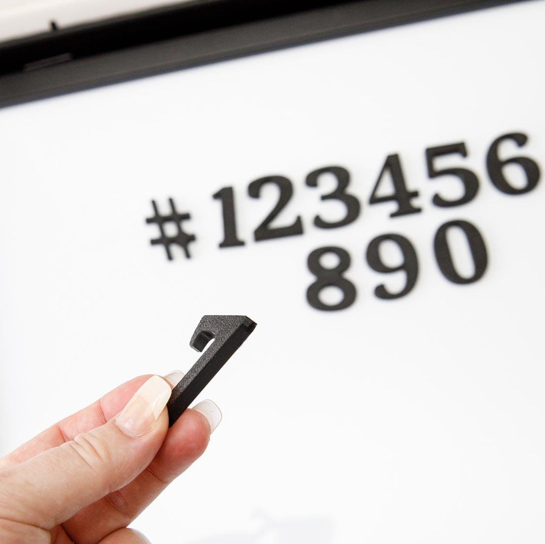 Set of 22 Brilliant Number Magnets – magnetic black or oak numbers for frames and displays.